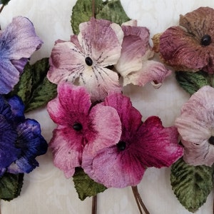 Velvet flowers . Millinery pansies. millinery flowers. velvet flowers. Vintage millinery . velvet pansies. vintage pansies.