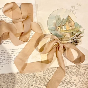 vintage ribbon. soft ribbon trim in caramel. pale caramel vintage ribbon for scrapbooking and sewing projects.