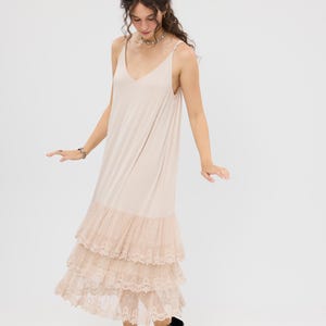 Evangeline cream lace ruffled dress . Gorgeous 3 tiered lace ruffled dress , can be worn layered under garments or a show stopper dress !