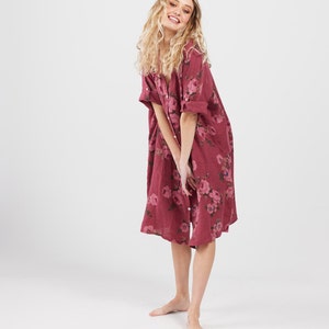 Linen coatdress in Burgundy rose floral. Casual button up dress that can be worn as a duster or as a dress.