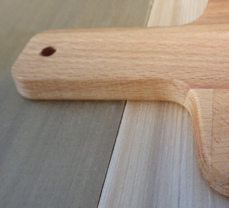 All you need is love Solid Beech Cutting Board with Woodburning Illustration of Classic Saying love is all you need