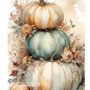 May include: A stack of three pumpkins, painted in watercolor, with a light orange, teal, and white color scheme. The pumpkins are surrounded by leaves and flowers, creating a fall-themed image.