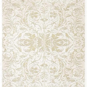May include: A white background with a gold floral pattern. The pattern is intricate and includes birds and leaves. The text "Id. Collection" is at the top of the image.