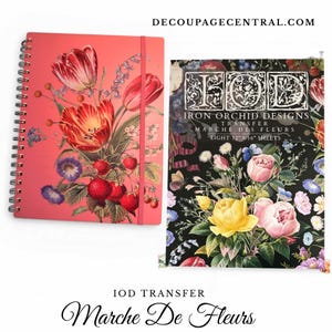 May include: A spiral-bound notebook with a red cover featuring a floral design of tulips, strawberries, and other flowers. Next to it is a black and white floral transfer sheet with the text "Iron Orchid Designs Transfer Marche Des Fleurs."