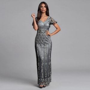Vestido Gatsby gris plateado, vestido de noche vintage con mangas estilo art déco y detalles de cuentas.