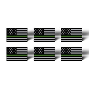 May include: Six black and white American flag decals with a green stripe across the middle. The decals are ideal for showing support for law enforcement.