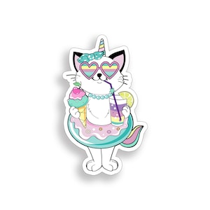 May include: A white cat with a unicorn horn, wearing heart-shaped sunglasses and a pearl necklace, floats in a turquoise and pink donut-shaped pool float. The cat holds a pink and green ice cream cone in one paw and a purple and yellow drink with a straw in the other.