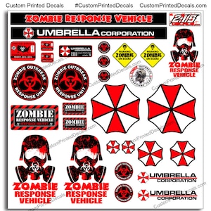 May include: A set of 15 red and black zombie response vehicle decals featuring the Umbrella Corporation logo, a biohazard symbol, and the text "Zombie Response Vehicle".