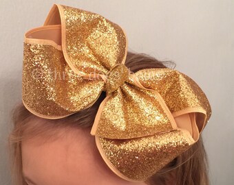 gold bow on hard headband large gold bow gold headband etsy