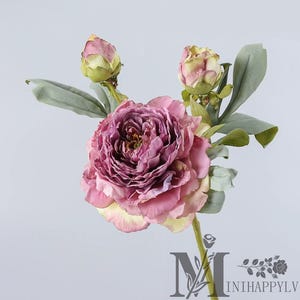 May include: A faux peony flower with a large, ruffled, deep pink bloom and two buds. The flower has a yellow base and green leaves. The stem is green. The logo "MINIHAPPYL" is visible at the bottom.