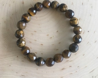 HBGEM10TGREYEBRCLET- FACEED ROUND 10 mm Tiger Eye - BRACELET. Se vende individualmente.