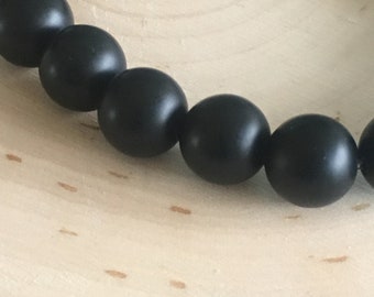 HBGEM10MATTONYXBRCLET- ROUND 10 mm matted Onyx BRACELET. Se vende individualmente.