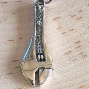 HBSS1551WRNCHPNDT - For HIM - 15 mm X 51 mm - heavy weight WRENCH SHAPED pendant in 925 silver. Sold individually.