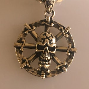 HBSSWHLSWRDSKL2943PNDT - SKULL, SWORDS, Ship wheel -  29 mm x 43 mm PENDANT  in 925 Sterling silver. Chain not included Sold individually.