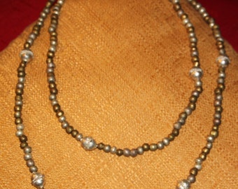 Long large Ethiopian beaded necklace made of nickle, used bullets and traditional large beads.