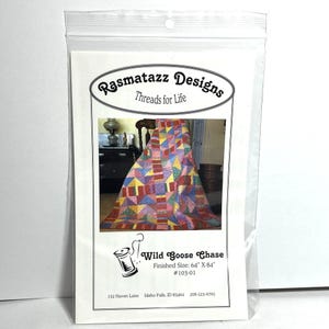 May include: A quilting pattern for a Wild Goose Chase quilt, finished size 64 inches by 84 inches. The pattern is from Rasmatazz Designs, Threads for Life. The pattern shows a colorful quilt with a variety of fabrics.