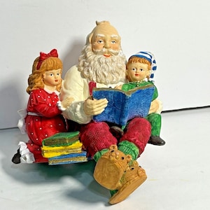 Santa Claus Reading to Children Figurine