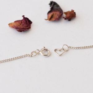 Silver clasp and heart fitting