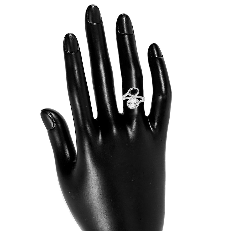 Sterling Silver with Oval Shape Natural Black Spinel and White Topaz Bypass Ring