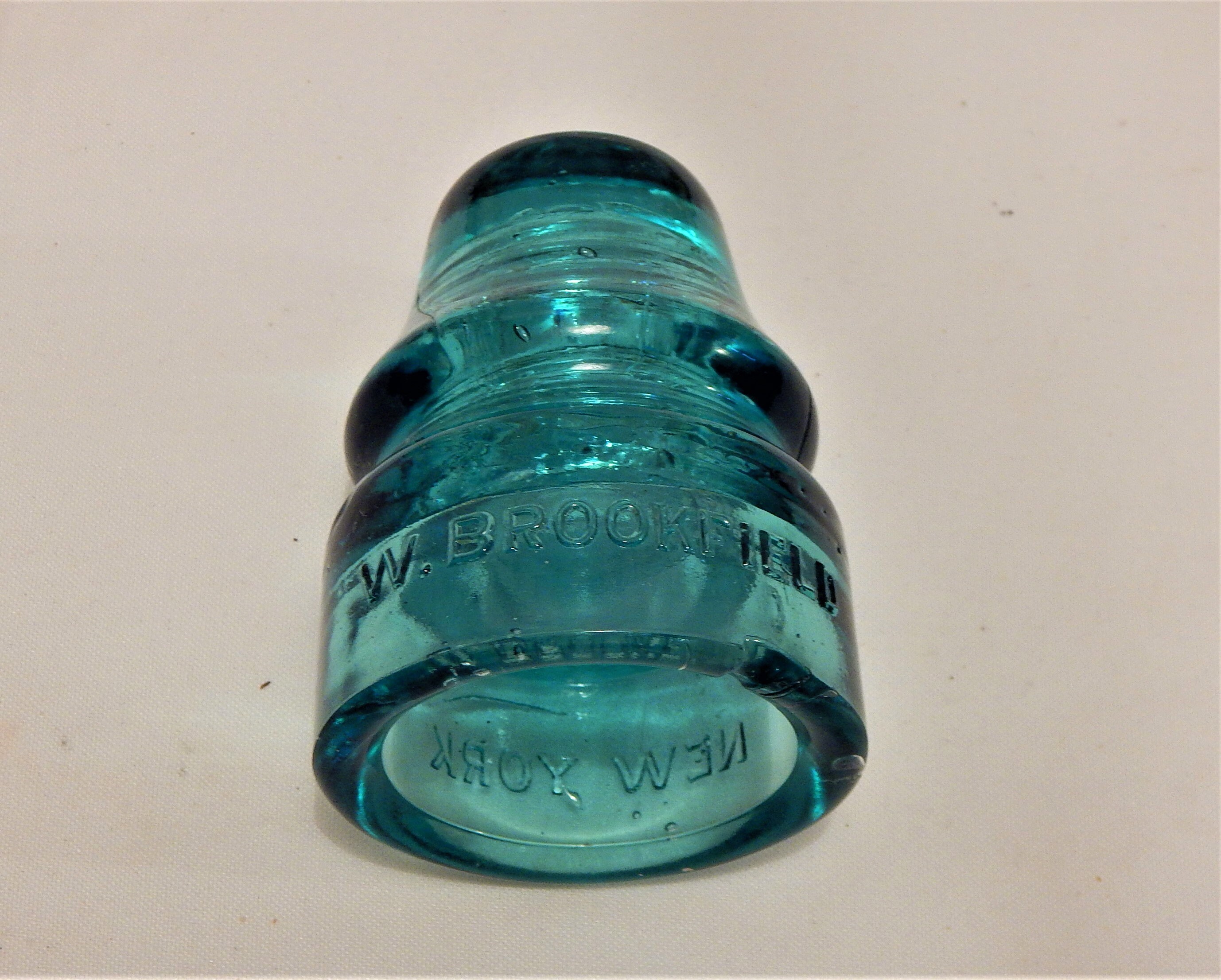 Glass Insulators green glass electrical insulator cap Brookfield blue W