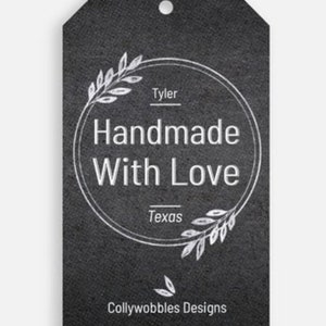 May include: Black and white gift tag with a silver circle and the text "Handmade With Love" inside the circle. The text "Tyler" and "Texas" are above and below the circle, respectively. The text "Collywobbles Designs" is at the bottom of the tag.