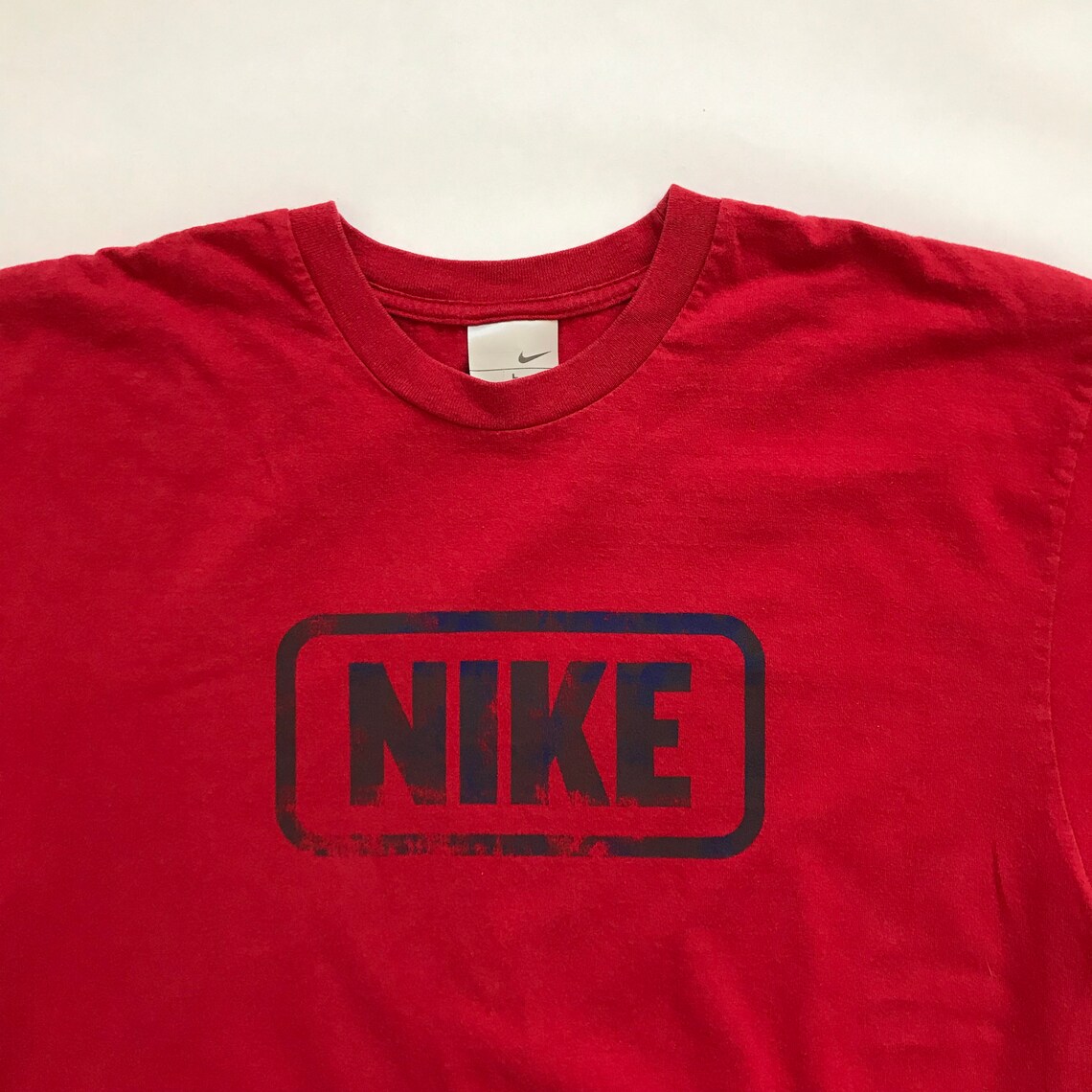 red nike shirt