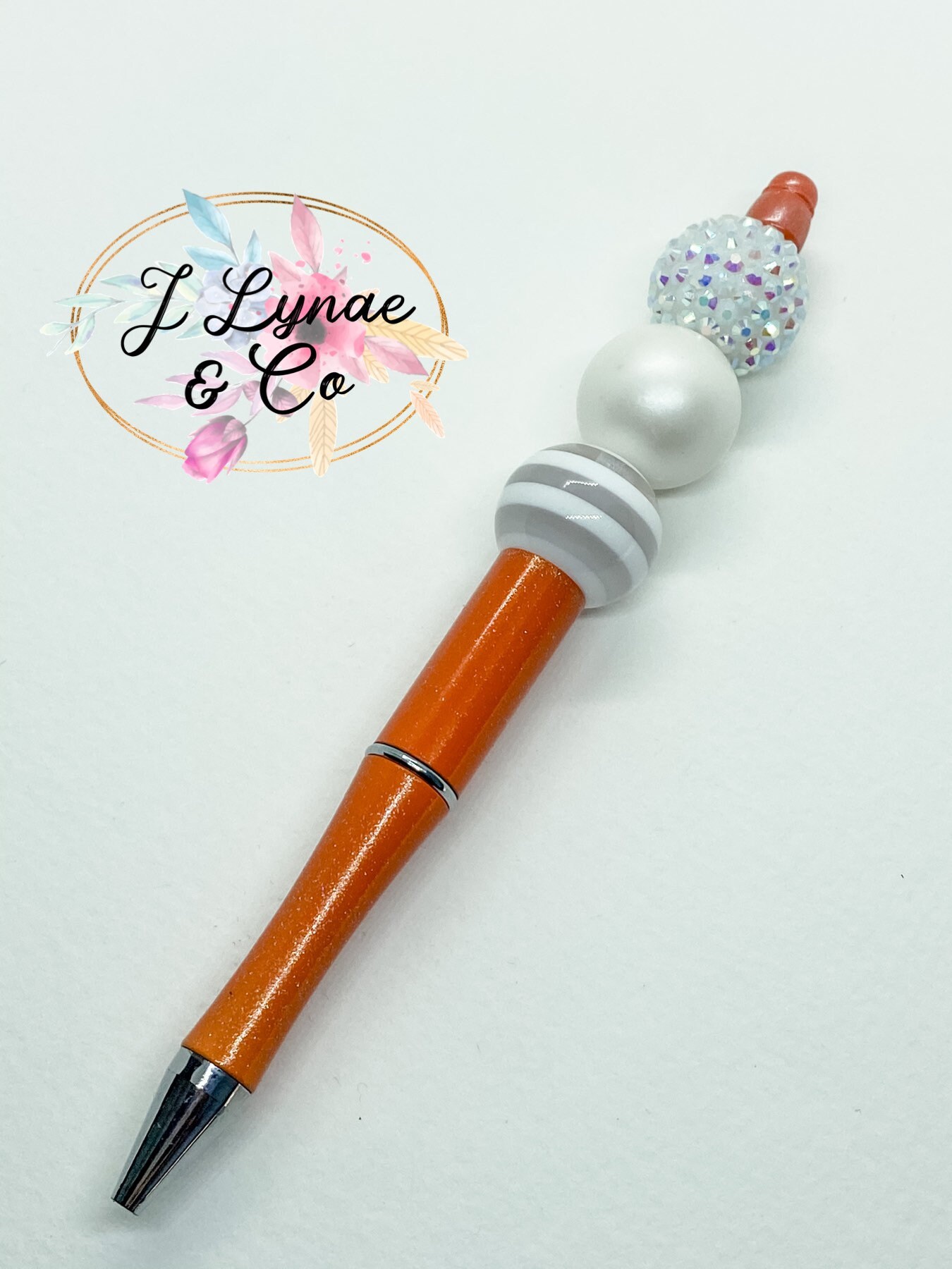Bubblegum Bead Pens Three With Different Designs On Them Sitting Next
To Each Other