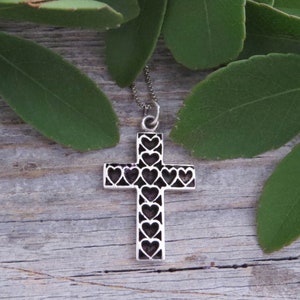 Sterling Silver Cross Pendant with Hearts