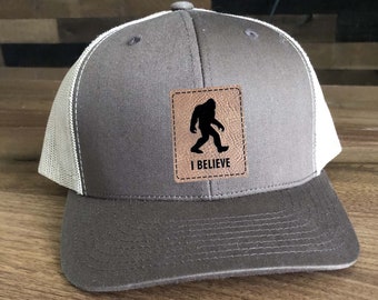 Squatch Big Foot I Believe Trucker Hat - Mesh Back with Patch Custom Engraved including Choices of Hat Color, Patch Color