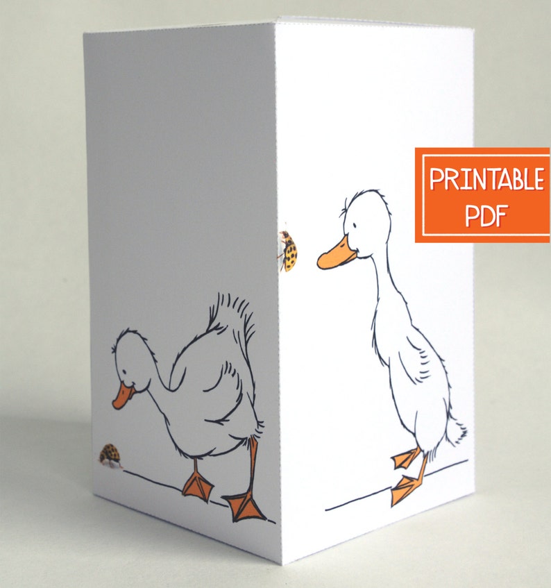 May include: Printable PDF card featuring two white ducks with orange beaks and feet. One duck is looking at a ladybug, while the other duck is looking at the viewer. The card has a white background.