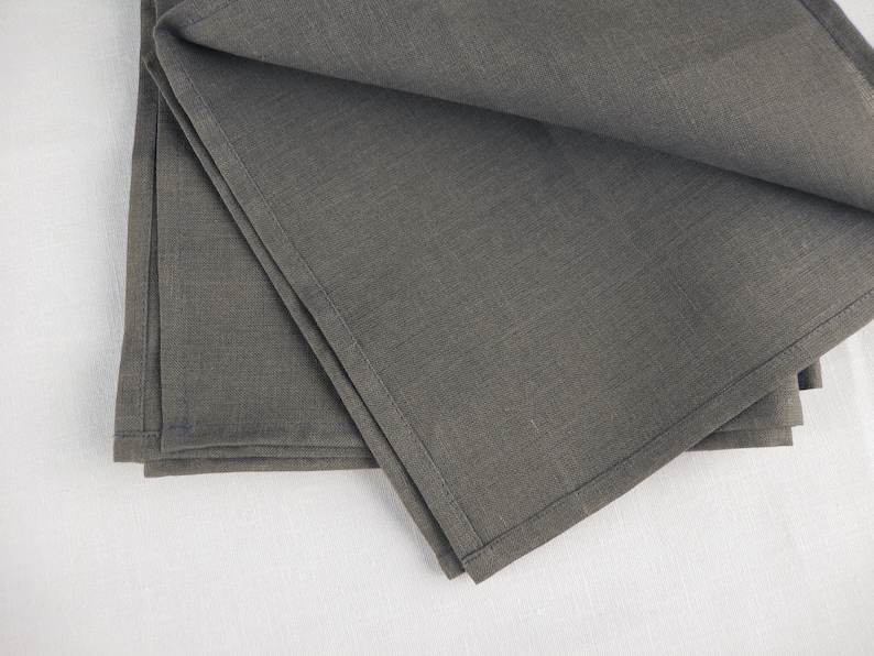 Folded graphite linen napkins, close view