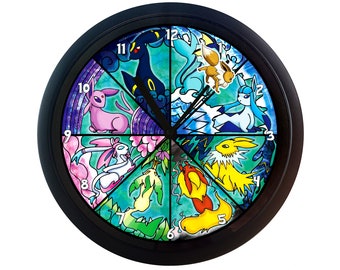 May include: A black framed clock with a colorful stained glass design featuring various Pokemon characters. The clock face is divided into 12 sections, each featuring a different Pokemon, including a pink Eevee, a blue Vaporeon, a yellow Jolteon, and a red Flareon.