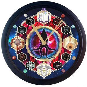 May include: A black clock with a blue background and a colorful design. The clock face features a stylized octopus with tentacles, surrounded by a circle of 12 symbols. The numbers 1 through 12 are displayed around the clock face.