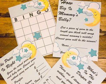 May include: A set of four baby shower game cards with a blue and yellow moon and star design. The cards include games like "How Big Is Mommy's Belly?" and "What's In The Diaper Bag?"