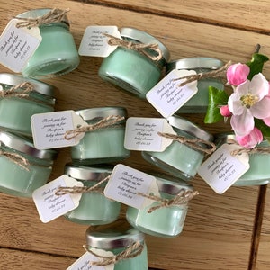 Eco conscious soy candles tied with hemp twine- and tag featuring your personalised message.  Multi event candle favours to your colour theme and fragrance.  UK sourced recyclable glass. Cute 1oz favour size 6-8 burn time