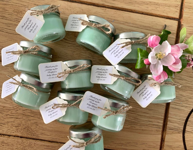 Eco conscious soy candles tied with hemp twine- and tag featuring your personalised message.  Multi event candle favours to your colour theme and fragrance.  UK sourced recyclable glass. Cute 1oz favour size 6-8 burn time