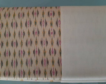Thai Mudmee Silk Textile. Creme color background