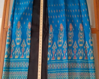 Thai mudmee woven Ikat silk wrap skirt or sarong, ready to wear. Turquoise Blue.