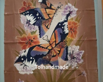 Vintage Indonesian Batik painting. Traditional Wax and dye method. Butterflies