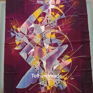 Vintage Indonesian batik painting. Traditional Wax and dye method. Angel Fish