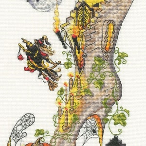 May include: A whimsical Halloween-themed cross-stitch pattern featuring a witch flying on a broomstick, a jack-o'-lantern, bats, and a tall, ornate boot shaped like a castle.