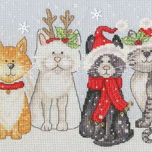 May include: A group of six cats wearing festive Christmas hats and accessories. The cats are sitting in a row on a snowy background.