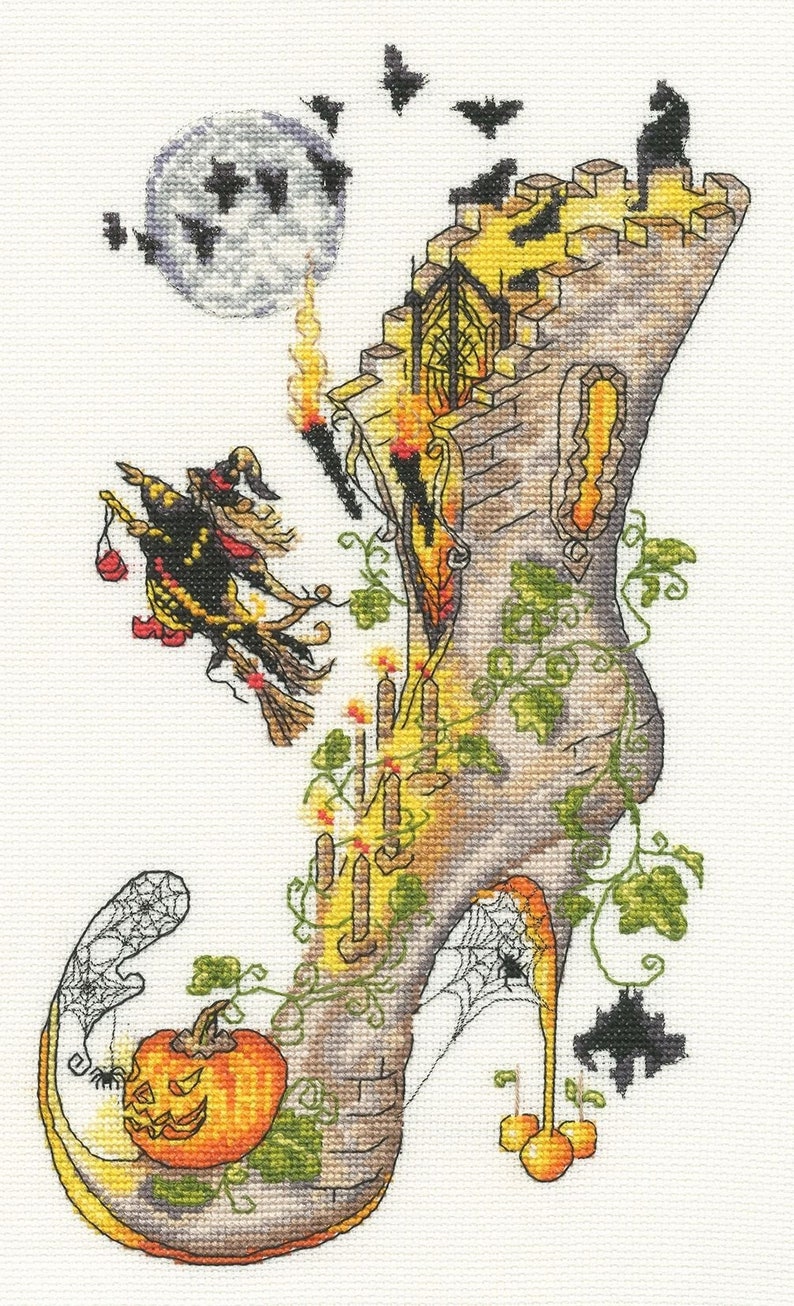 May include: A whimsical Halloween-themed cross-stitch pattern featuring a witch flying on a broomstick, a jack-o'-lantern, bats, and a tall, ornate boot shaped like a castle.