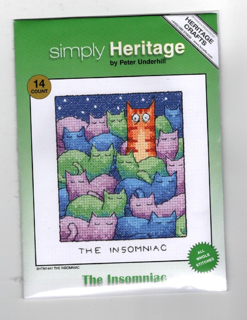 May include: A cross-stitch pattern featuring a group of cats sleeping, with one cat awake and looking out at the viewer. The pattern is titled "The Insomniac" and is from the "Simply Heritage" collection by Peter Underhill. The pattern is 14 count and uses all whole stitches.