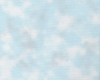 May include: A light blue fabric with a white tie-dye pattern. The fabric has a subtle texture.