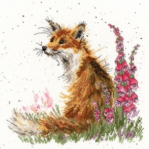 May include: Cross-stitch image of a fox with orange and brown fur, looking upwards. The fox is surrounded by pink and purple flowers and green foliage. The background is white with small brown speckles.