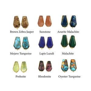 Pode incluir: Conjunto de 10 pares de brincos de pedras preciosas. Cada par apresenta um tipo diferente de pedra preciosa, incluindo jaspe zebra marrom, pedra do sol, azurita malaquita, turquesa Mojave, lápis-lazúli, malaquita, prehnita, rodonita e turquesa de ostra.