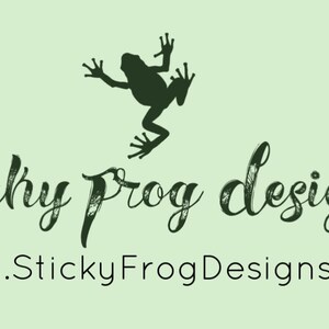 May include: A green frog silhouette jumps above the text "sticky frog designs" and the website address "www.StickyFrogDesigns.com".