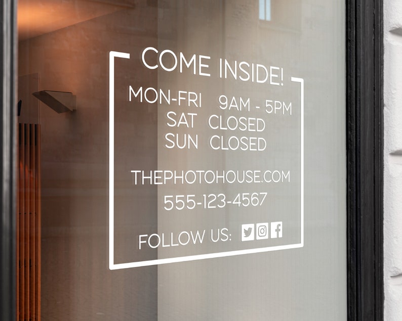 May include: A white sign on a glass door with the text 'COME INSIDE!'  'MON-FRI 9AM - 5PM' 'SAT CLOSED' 'SUN CLOSED' 'THEPHOTOHOUSE.COM' '555-123-4567' 'FOLLOW US: of'.