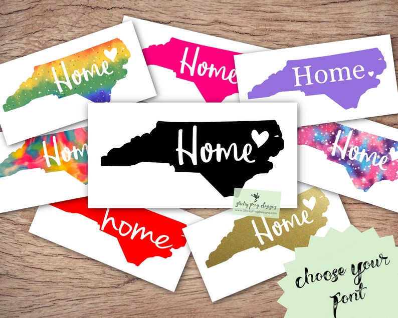 May include: A collection of North Carolina state outline decals with the word "Home" in various fonts and colors. The decals are on white backgrounds and are arranged in a collage. The text "choose your font" is written in cursive at the bottom of the image.